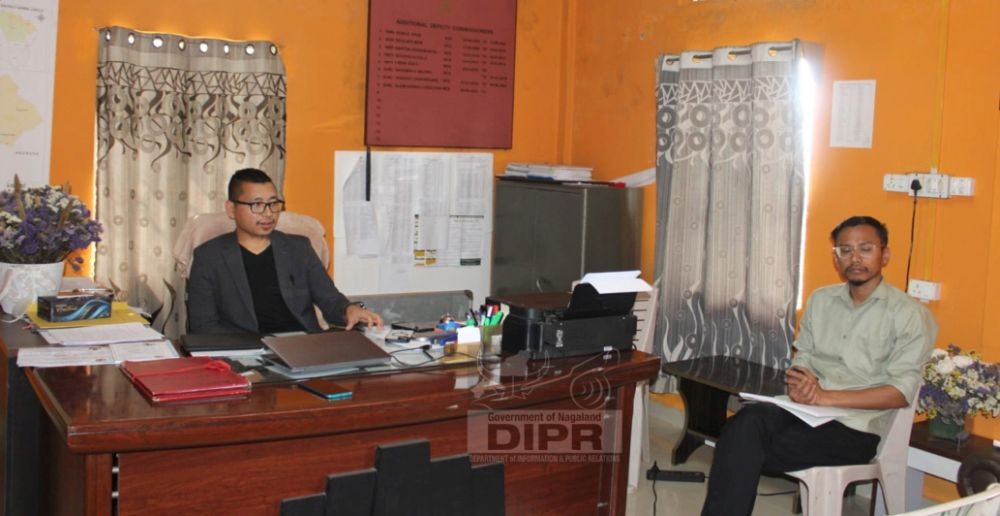 Vekusheyi Rhakho, NCS,  chairs the review meeting held at the Additional Deputy Commissioner's (ADC) office chamber in Chiephobozou on June 24. (DIPR Photo)